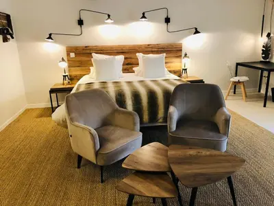 Coin salon dans l'établissement Zewwelatreppler - La Grange aux Petits Oignons - Chambre Cigogne