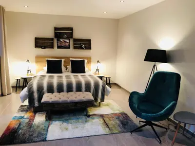 Un ou plusieurs lits dans un hébergement de l'établissement Zewwelatreppler - La Grange aux Petits Oignons - Chambre Rainette