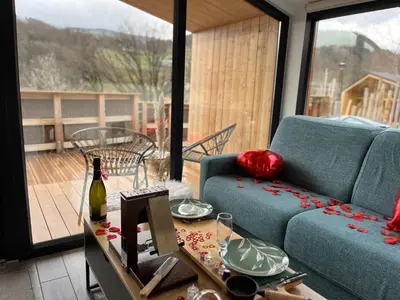 Balcon ou terrasse dans l'établissement Domaine des Constellations - Tiny Houses & Bains Nordiques