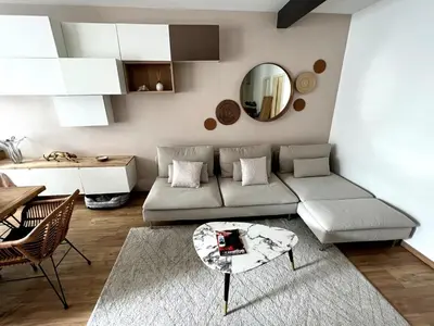 Coin salon dans l'établissement Belle chambre cosy, proche centre-ville et gare