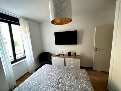 Télévision ou salle de divertissement dans l'établissement Belle chambre cosy, proche centre-ville et gare