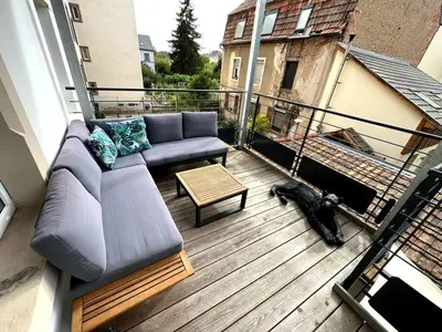 Coin salon dans l'établissement Belle chambre cosy, proche centre-ville et gare