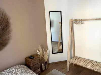Un ou plusieurs lits dans un hébergement de l'établissement Belle chambre cosy, proche centre-ville et gare