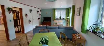 Coin salon dans l'établissement Le gîte de Philippe, Calme et spacieux