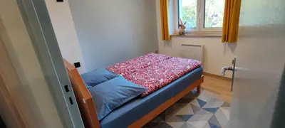 Un ou plusieurs lits dans un hébergement de l'établissement Le gîte de Philippe, Calme et spacieux