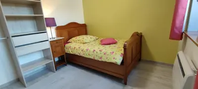 Un ou plusieurs lits dans un hébergement de l'établissement Le gîte de Philippe, Calme et spacieux