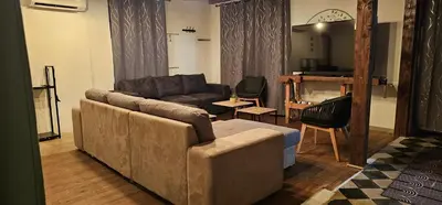 Coin salon dans l'établissement Le Phoenix - gîte 15 personnes parc naturel Vosges Saônoises