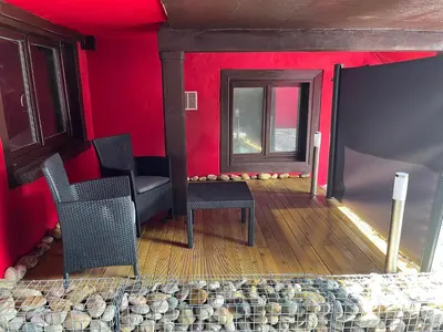 Coin salon dans l'établissement L’Alsacienne room et spa
