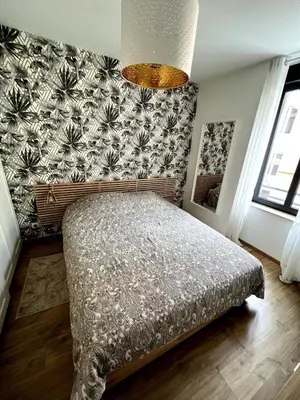 Un ou plusieurs lits dans un hébergement de l'établissement Chambre cosy, proche centre-ville et gare