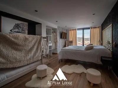 Un ou plusieurs lits dans un hébergement de l'établissement ATPeak Lodge Maison de Montagne d'exception