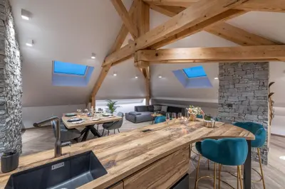 Coin salon dans l'établissement Mairnaige, luxueux appartement avec sauna