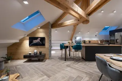 Coin salon dans l'établissement Mairnaige, luxueux appartement avec sauna