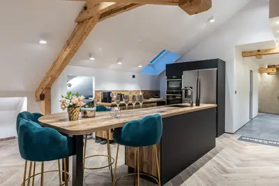 Cuisine ou kitchenette dans l'établissement Mairnaige, luxueux appartement avec sauna