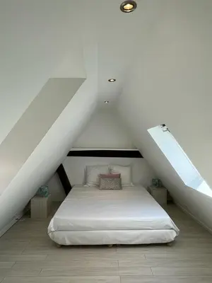 Un ou plusieurs lits dans un hébergement de l'établissement La Mariana - Old Town Cosy Apartments