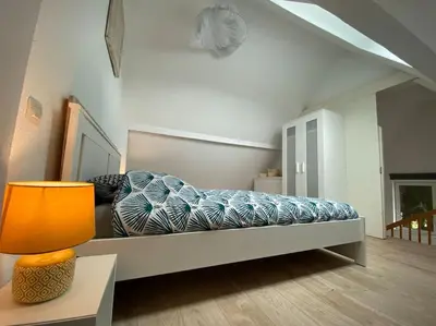 Un ou plusieurs lits dans un hébergement de l'établissement Logement de charme au coeur de la nature