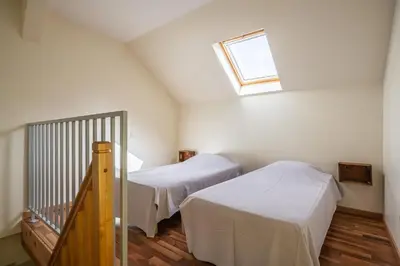 Un ou plusieurs lits dans un hébergement de l'établissement Gite St Joseph gitesdes2vallees