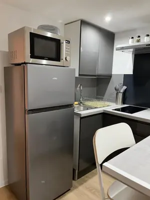 Cuisine ou kitchenette dans l'établissement Chouett'Appart proche frontières