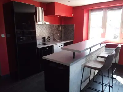 Cuisine ou kitchenette dans l'établissement Au Bercail