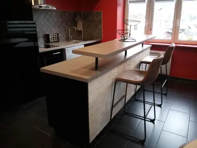 Cuisine ou kitchenette dans l'établissement Au Bercail