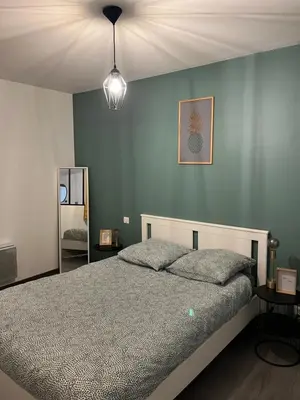 Un ou plusieurs lits dans un hébergement de l'établissement Appartement cosy hyper centre colmar