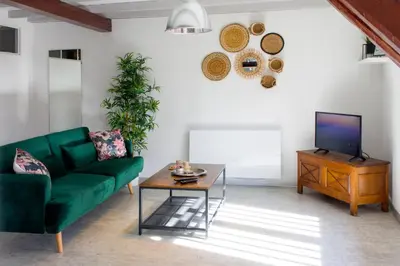 Coin salon dans l'établissement La couronne Maison 80m2 garage & terrasse