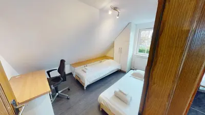 Un ou plusieurs lits dans un hébergement de l'établissement Ô calme Maison familiale - Wickerschwihr