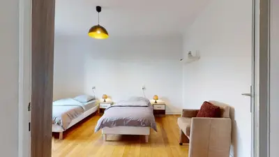 Un ou plusieurs lits dans un hébergement de l'établissement Appartement Le Passage - Ostheim