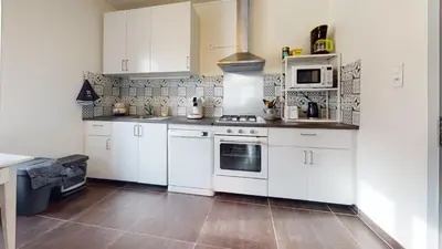 Cuisine ou kitchenette dans l'établissement La maison Blanche - Issenheim