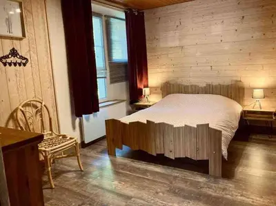 Un ou plusieurs lits dans un hébergement de l'établissement Le Nordmann - au coeur de Gérardmer