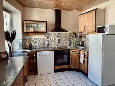 Cuisine ou kitchenette dans l'établissement Le Nordmann - au coeur de Gérardmer