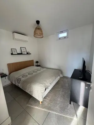 Un ou plusieurs lits dans un hébergement de l'établissement Appartement plain-pied au coeur de l'Alsace