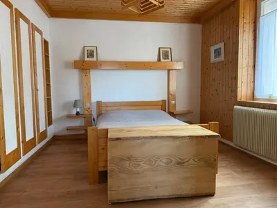 Un ou plusieurs lits dans un hébergement de l'établissement Bel appartement dans une ferme Vosgienne