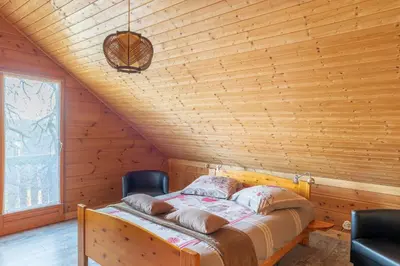 Un ou plusieurs lits dans un hébergement de l'établissement Chalet Café-Chocolat