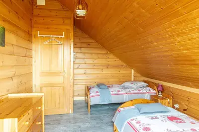 Un ou plusieurs lits dans un hébergement de l'établissement Chalet Café-Chocolat