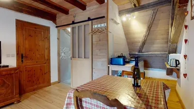 Coin salon dans l'établissement Les Appartements Manala - Turckheim