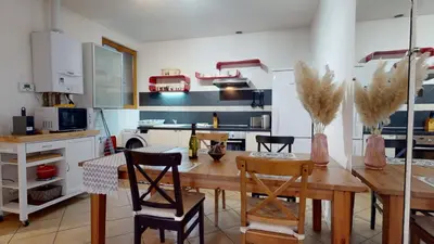 Cuisine ou kitchenette dans l'établissement Magic Home - Les Taillandiers