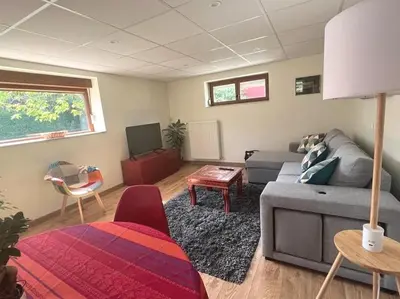 Coin salon dans l'établissement Au petit bonheur