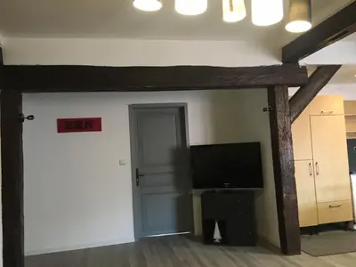 Télévision ou salle de divertissement dans l'établissement Le gite 5 - Le Château du Landsberg