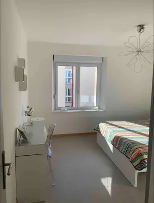 Un ou plusieurs lits dans un hébergement de l'établissement Magnifique T3 avec balcon vue montagne , plein centre et proche du lac