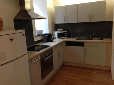 Cuisine ou kitchenette dans l'établissement Gîte 