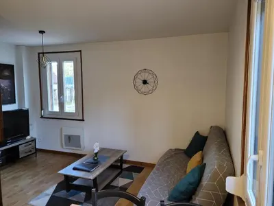 Télévision ou salle de divertissement dans l'établissement Beau duplex à proximité du lac de Gérardmer avec place de parking