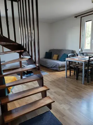 Coin salon dans l'établissement Beau duplex à proximité du lac de Gérardmer avec place de parking