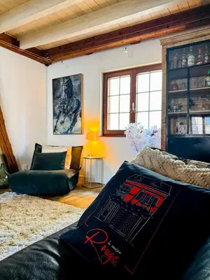 Coin salon dans l'établissement La Maison Rouge Au coeur historique de Riquewihr