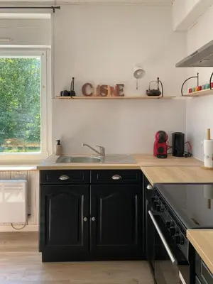 Cuisine ou kitchenette dans l'établissement Maison chaleureuse - Gérardmer