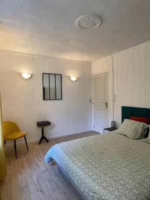 Un ou plusieurs lits dans un hébergement de l'établissement Maison chaleureuse - Gérardmer