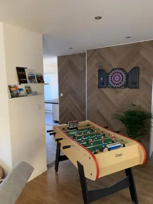 Salle de jeux dans l'établissement Appartement centre-ville rénové 6/8 personnes
