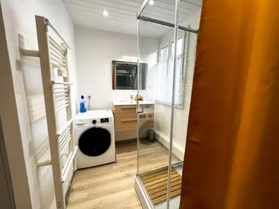 Salle de bains dans l'établissement Au Duplex de Jeannala