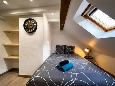 Un ou plusieurs lits dans un hébergement de l'établissement Au Duplex de Jeannala