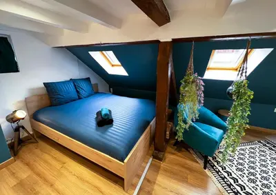 Un ou plusieurs lits dans un hébergement de l'établissement Au Duplex de Jeannala