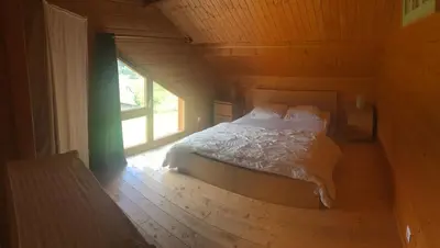 Un ou plusieurs lits dans un hébergement de l'établissement Grand Valtin : chalet écolo 4 étoiles 14 personnes